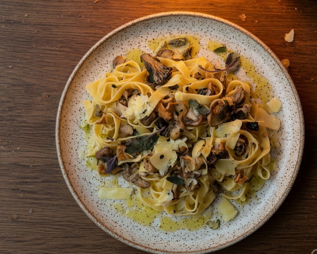 Handmade pasta with mushrooms